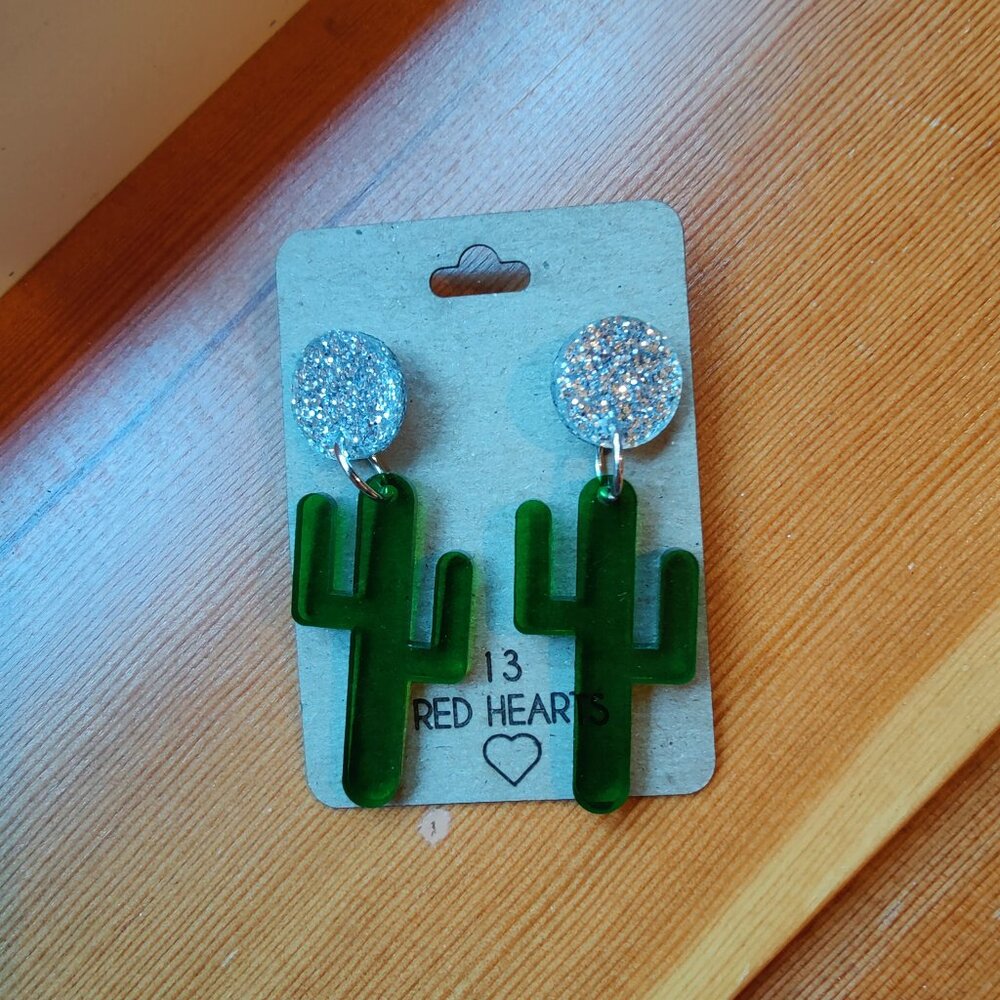 Green cactus earrings with silver glitter!